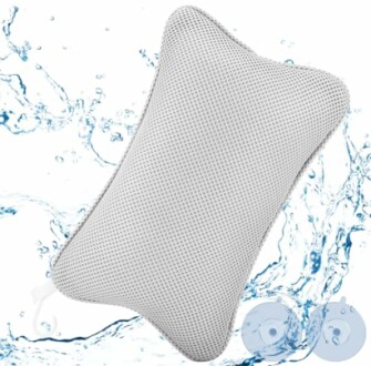 Oreiller de bain avec ventouses et éclaboussures d'eau.