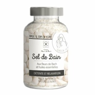 Bouteille de sel de bain avec étiquette en français.