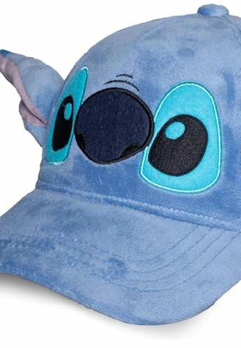 Casquette bleue avec motif de personnage de dessin animé.