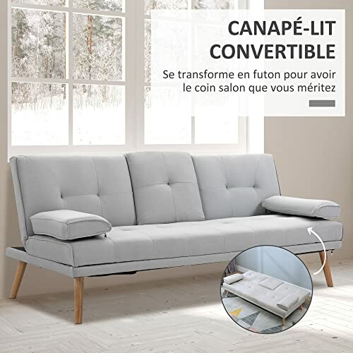 Canapé-lit convertible gris clair dans un salon moderne