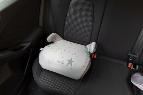 Siège d'appoint pour enfant dans une voiture.