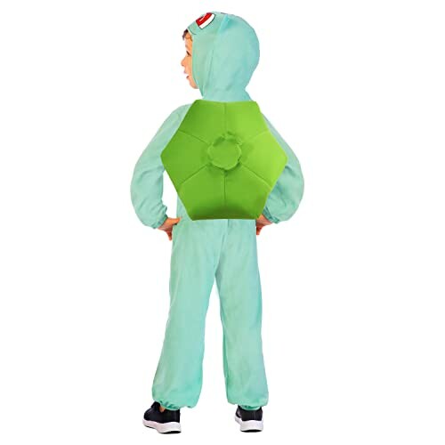 Enfant en costume de tortue, vue de dos.