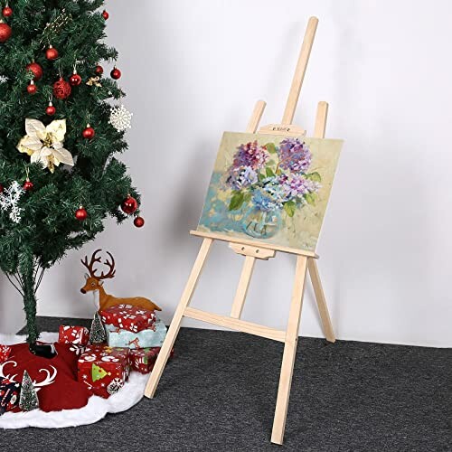 Arbre de Noël et chevalet avec peinture de fleurs