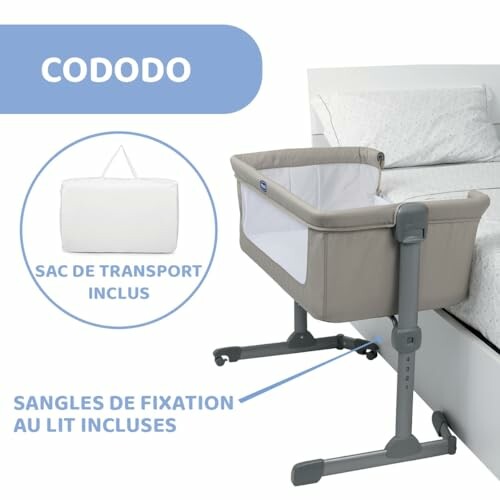 Lit cododo beige à côté d'un lit pour adulte.