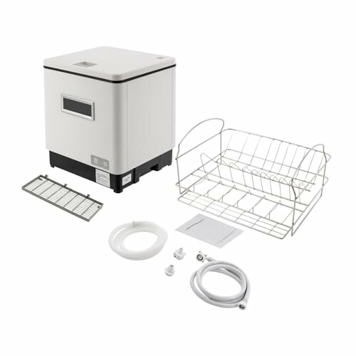 Lave-vaisselle compact avec accessoires.