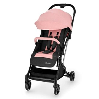 Poussette compacte pliable avec canopy rose.