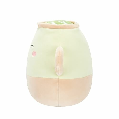 Jouet en peluche mignon avec visage souriant.