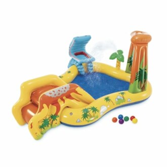 Piscine gonflable pour enfants à thème dinosaures avec toboggan et fontaine.