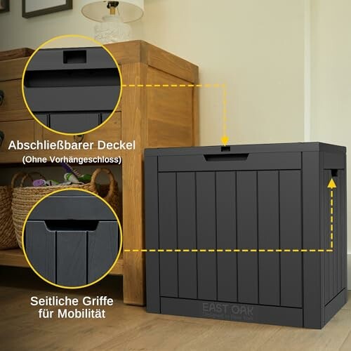 Boîte de rangement noire avec couvercle verrouillable et poignées latérales.