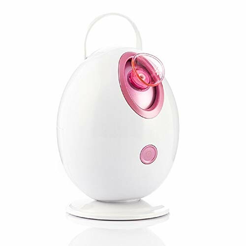 Appareil vapeur pour le visage, design ovale blanc et rose.