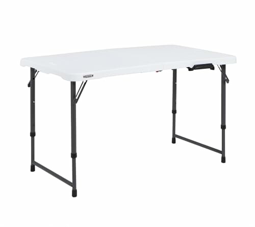 Table pliante blanche avec pieds noirs