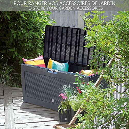 Coffre de rangement de jardin avec couvercle ouvert, coussins et plantes.