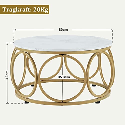 Table basse ronde en métal doré avec plateau en marbre.