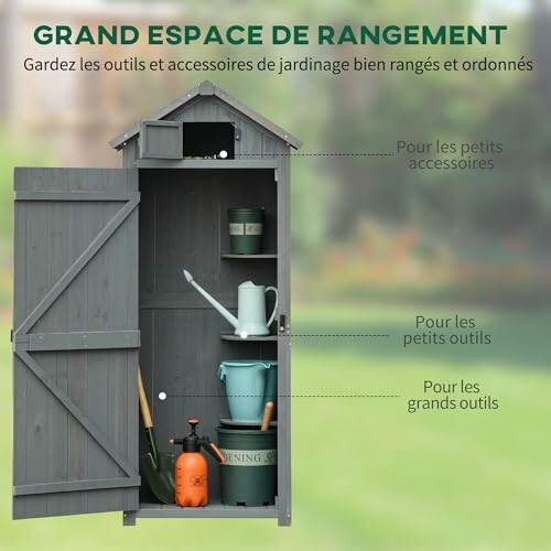 Armoire de jardin grise avec outils à l'intérieur.