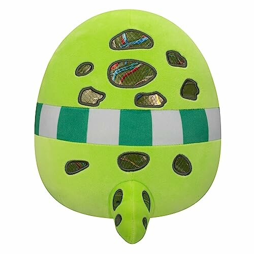 Coussin en forme de carapace de tortue verte.