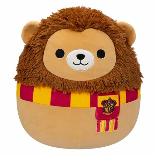 Peluche de lion avec écharpe Gryffondor.