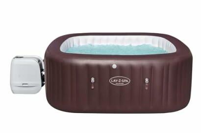 Bain à remous gonflable marron avec eau bleue.