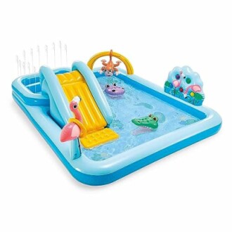 Piscine gonflable pour enfants avec toboggan et animaux colorés.
