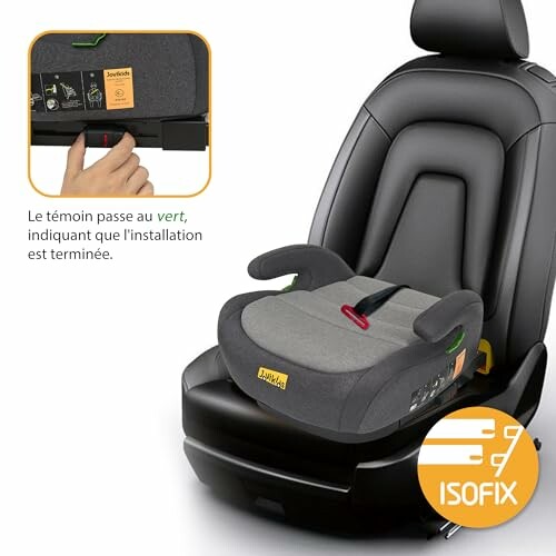 Siège auto avec système Isofix installé sur un siège de voiture, témoin vert visible.