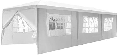 Grande tente blanche avec fenêtres transparentes.