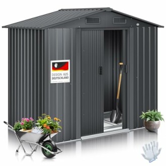 Abri de jardin métallique avec outils et plantes.