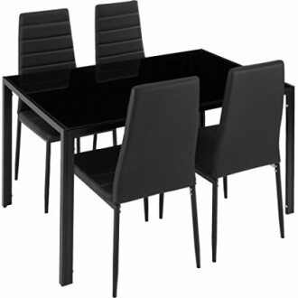 Table à manger moderne noire avec quatre chaises.