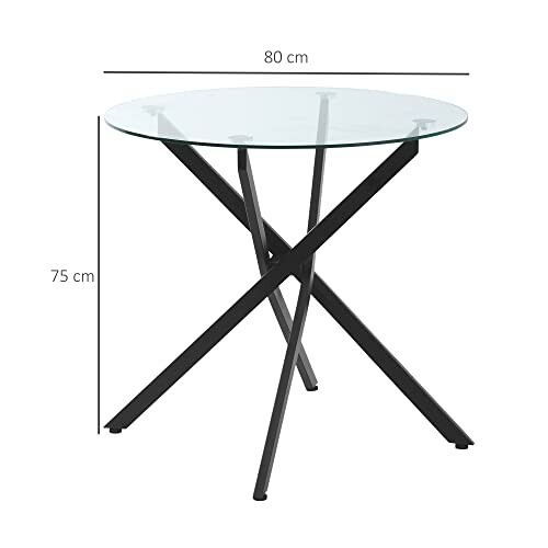 Table ronde moderne en verre avec pieds en métal noir.