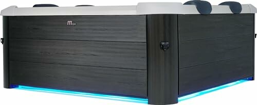 Bain à remous moderne avec éclairage LED bleu.