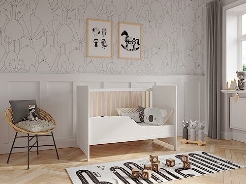 Chambre de bébé moderne avec lit et jouets.