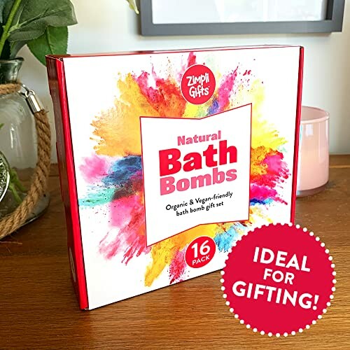 Coffret cadeau de bombes de bain naturelles sur une table en bois.