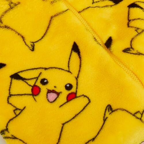Couverture jaune avec motif de Pikachu joyeux