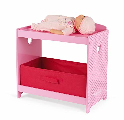 Table à langer rose pour poupée avec boîte de rangement rouge.