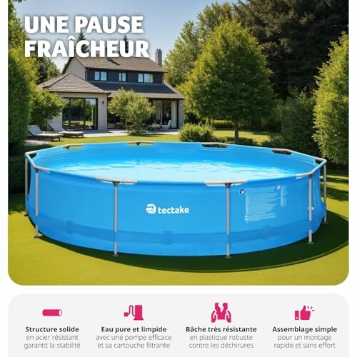Piscine hors sol ronde dans un jardin.