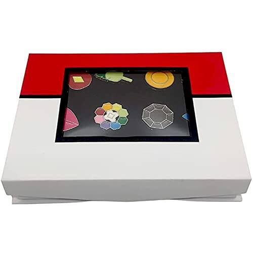Ensemble de badges Pokémon dans une boîte