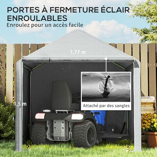 Abri de stockage avec portes à fermeture éclair, tondeuse à l'intérieur.