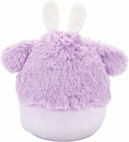 Jouet en peluche violet avec oreilles blanches.