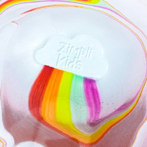 Bombe de bain en forme de nuage avec arc-en-ciel.