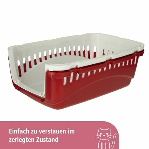 Cage de transport pour chat rouge et blanche démontée