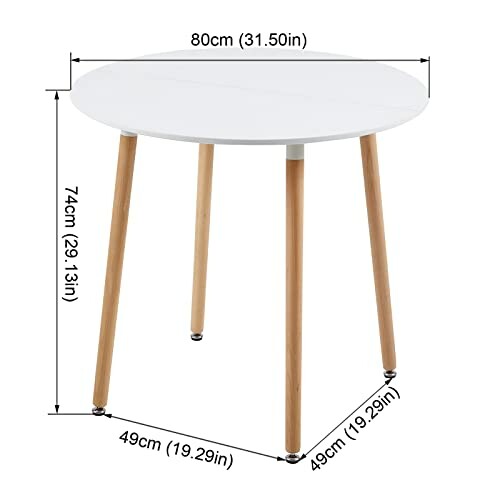 Table ronde blanche avec dimensions en centimètres et pouces.