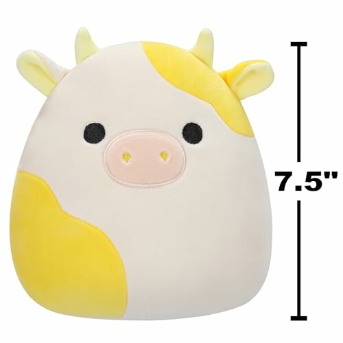 Peluche en forme de vache avec tâches jaunes, mesurant 7,5 pouces.