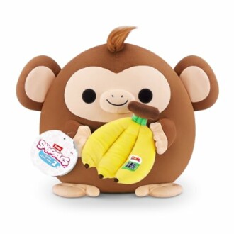 Peluche singe avec des bananes.
