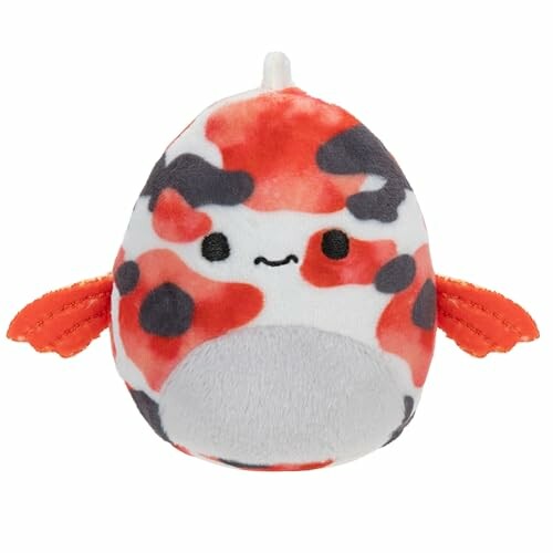 Peluche en forme de poisson koi avec motifs colorés.