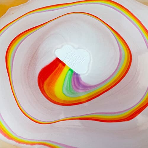 Peinture tourbillonnante aux couleurs de l'arc-en-ciel.