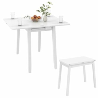 Table pliante blanche avec un banc et des verres posés dessus.