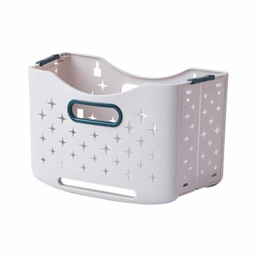 Panier de rangement blanc avec motifs d'étoiles.