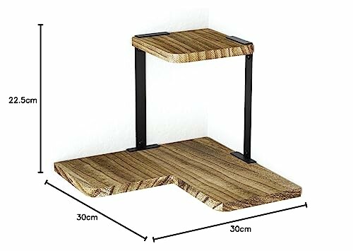 Étagère d'angle en bois à deux niveaux avec supports métalliques noirs.