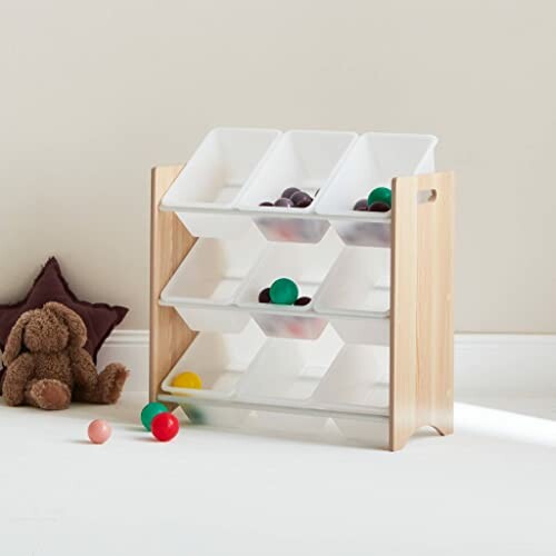 Unité de rangement en bois pour jouets avec bacs.